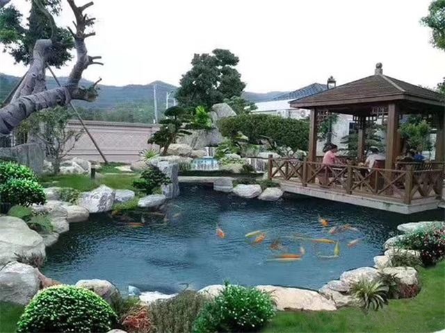 海南藏族庭院鱼池假山设计